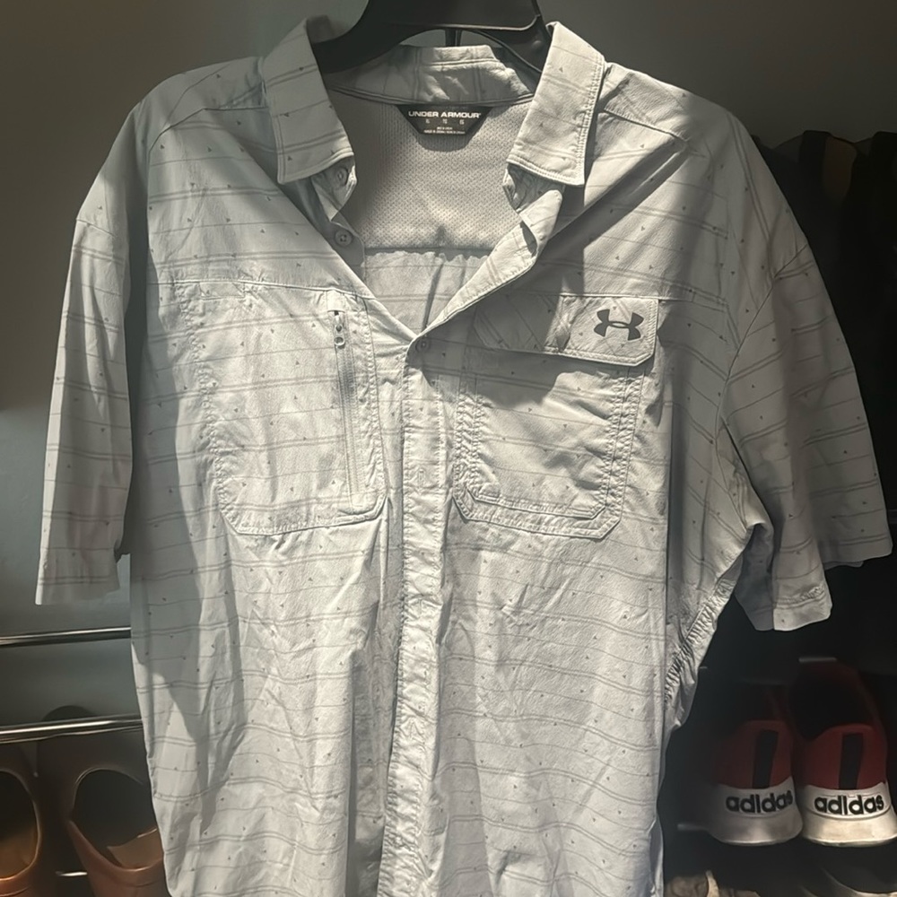 Grey under armour short sleeve button up. Vented back.
